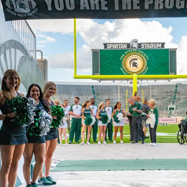 cheerleaders standing by the endzone