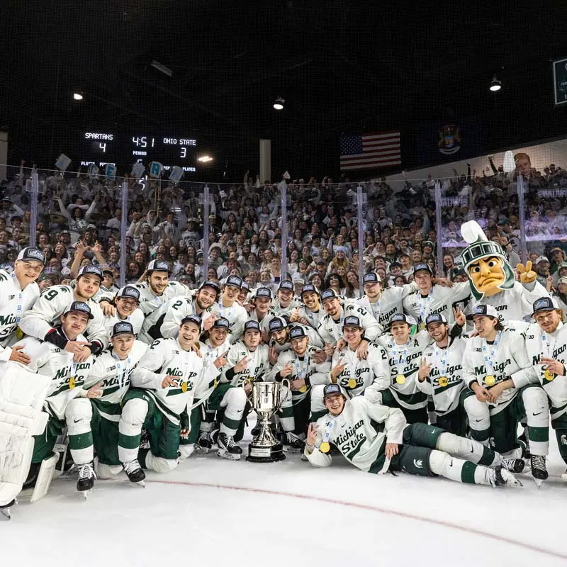 Ice hockey team celebrating Big Ten Championship