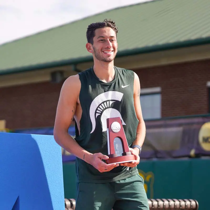 Men's tennis doubles champions celebrating their victory