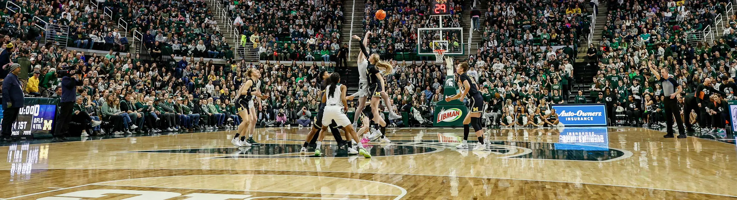 Full arena during a women's basketball game